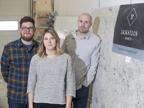 Brittany and Tristan Amendt, left, and Brett Erickson, who took over Saskatoon Granite Inc. late last year.