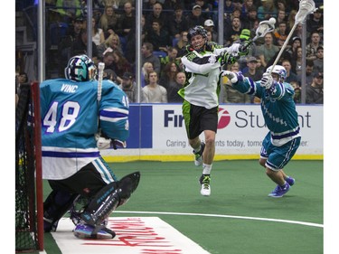 Saskatoon Rush forward Zack Greer takes a shot on Rochester Knighthawks goalie Matt Vinc in NLL first half action on Friday, February 19th, 2016.