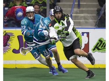 Saskatoon Rush defender Kyle Rubisch makes a pass against the Rochester Knighthawks in NLL first half action on Friday, February 19th, 2016.