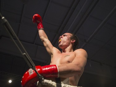 Matt Dumais celebrates after taking on Kelly Paige during the At Last: Championship boxing at Prairieland Park on Saturday, February 27th, 2016.