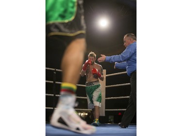 Paul Bzdel, right, takes on Shaklee Phinn during the main event of At Last: Championship boxing at Prairieland Park on Saturday, February 27th, 2016.
