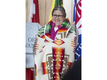 Gordon Oakes' wife Jean was happy to receive a blanket as a gift at the grand opening celebrations for Gordon Oakes Red Bear Student Centre at the University of Saskatchewan, February 3, 2016.