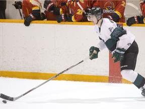 University of Saskatchewan defenceman  Tyler Borstmayer moves the puck against the University Calgary Dinos in CIS men's hockey action on Saturday, Jan. 16, 2016.