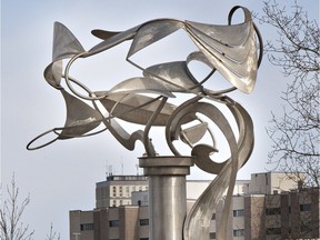 SASKATOON, SASK.--MAR. 31, 2014--Doug Bentham's "Unfurled" sculpture at the bottom of the University Bridge on March 31, 2014 in Saskatoon is a favourite of many among the public art in Saskatoon.  {RICHARD MARJAN/STARPHOENIX} to go with public art story.