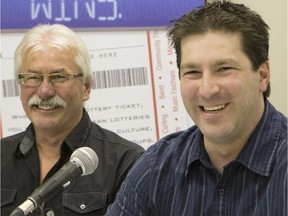 James Hofer (left) and son Curtis Hofer pick up their LOTTO MAX $1 million winnings in Saskatoon, Feb. 3, 2016.