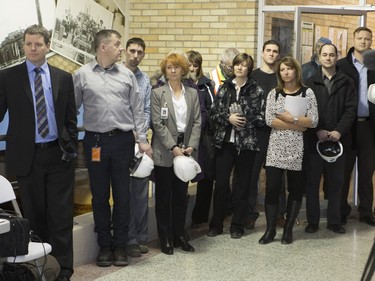 People listen to Saskatoon Eastview MLA Corey Tochor, on behalf of Government Relations Minister Jim Reiter, and Saskatoon Mayor Donald Atchison at an event to celebrate the completion of the City of Saskatoon Water Reservoir Expansion Project on Avenue H South, February 8, 2016. A tour of the facility followed ceremonies.