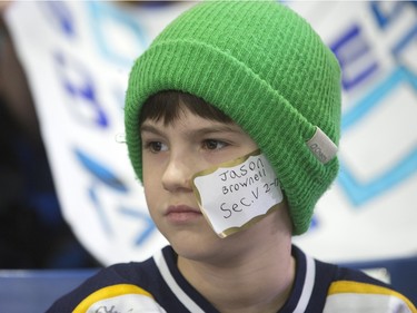 The lower bowl in SaskTel Centre was packed in the morning on February 22, 2016 as schoolchildren made up the audience in a rare day game for the Saskatoon Blades against the Brandon What Kings. Jason Forbister, Grade Four at Brownell School, enjoys the action.