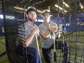 Instructor Jordan Draeger, left, and manager Matt Kosteniuk at Going Yard Baseball Warehouse, an indoor training facility in Saskatoon's north industrial area.