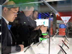 Visitors test smartphones on the third day of the Mobile World Congress in Barcelona on February 24, 2016. The world's biggest mobile fair Nobile World Congress (MWC), is held from February 22 to February 25. The tracking of smartphones using something known as Stingray technology in the U.S. has raised some red flags and the Canadian Civil Liberties Association, said the technology is something they'll be monitoring closely.