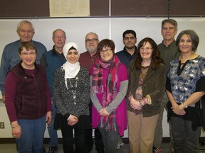 This group of people got together to help finance and support bringing a refugee family from Turkey into Canada and settle in Saskatoon. Rear from left: Ernie Woof, Arnie Nickel, Ray Hickey, Abdullah, Dale Scott. Front: Sheila Flory, Dhuha, Christine Zyla, Helen Smith-McIntyre, Janine Classen. Submitted Photo