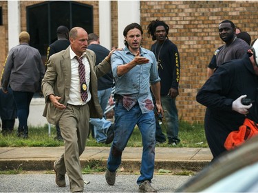 Woody Harrelson (L) and Casey Affleck star in "Triple 9."