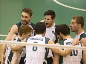 The University of Saskatchewan Huskies celebrate a point against the University of Regina Cougars in CIS men's volleyball action on Saturday, Feb. 20, 2016.