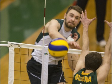 University of Saskatchewan Huskies Andrew Nelson hits the ball against the University of Regina Cougars in CIS Men's Volleyball action on Saturday, February 20th, 2016.