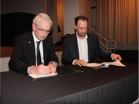 University of Saskatchewan President Peter Stoicheff and director of the NCTR Ry Moran can be seen signing a memorandum of understanding on Tuesday, Feb. 9 2016. Moran and Stoicheff said the partnership between the U of S and the NCTR is important when it comes to implementing systematic change across Canada as it will help educate the masses on Canada's residential schools.