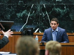 Former Gawker employee A.J. Daulerio, right, testifies at the Pinellas County Courthouse in St. Petersburg, Fla., Monday, March 14, 2016. Hulk Hogan is suing Gawker Media for $100 million for posting an edited video showing him having sex with his then-best friend&#039;s wife. Lawyers for Gawker Media began presenting their case on Monday. (Stephen Yang/New York Post via AP, Pool)