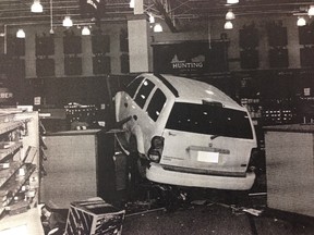 A court exhibit photo shows the aftermath on April 18, 2015, when George Mcauley crashed an SUV into Cabela's in Saskatoon and stole a rifle.