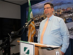 Acting director of public works with the city of Saskatoon Trent Schmidt can be seen at Saskatoon's City Hall on Thursday afternoon. There, he provided members of the media with an update on how city crews will be shifting their focus from snow removal, to pothole repair and drain management, following a streak of warm weather on March 10, 2016.