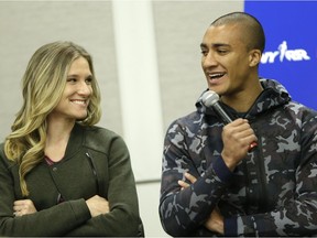 Ashton Eaton, right, and his wife, Brianne Theisen-Eaton, participate in a news conference in New York, Thursday, Feb. 18, 2016.