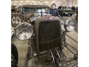 Owen Jeancart sits for a photograph with his 1929 Model A Ford custom made to resemble a Second World War B17 bomber at the Draggins 56th annual Car Show at Prairieland Park on March 25, 2016.