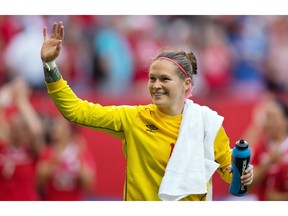 Canada goalkeeper Erin McLeod waves to fans after defeating Switzerland 1-0 in a FIFA Women's World Cup round of 16 soccer match in Vancouver on June 21, 2015. Canada will be without goalkeeper Erin McLeod as it prepares for the next step on the road to the Rio Olympics. And it appears the 33-year-old from St. Albert, Alta., is a long-term casualty.The Canadian Soccer Association said McLeod is "still assessing her options" after tearing her anterior cruciate ligament last week playing for her club team in Sweden.