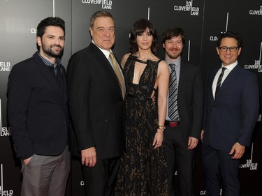 L-R: Dan Trachtenberg, John Goodman, Mary Elizabeth Winstead, John Gallagher Jr. and J.J. Abrams attend the premiere of "10 Cloverfield Lane" at AMC Loews Lincoln Square in New York, March 8, 2016.