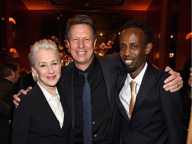 L-R: Helen Mirren, director Gavin Hood and Barkhad Abdi attend the "Eye In The Sky" New York premiere after party at the Parkview Lounge on March 9, 2016 in New York City.
