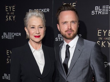 Helen Mirren and Aaron Paul attend the premiere of "Eye In The Sky" at AMC Loews Lincoln Square on March 9, 2016 in New York.