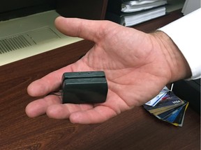 A credit card skimmer, used to steal personal data from businesses, is seen in this file photo.