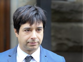 Jian Ghomeshi leaves the courthouse at Old City Hall in Toronto after he was found not guilty on all charges on March 24, 2016.