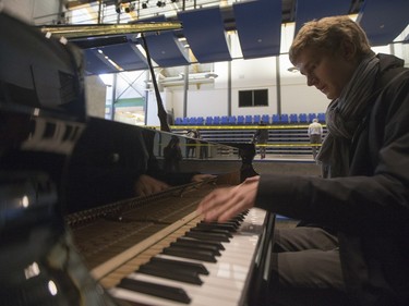Jan Lisiecki, classical pianist, checks the tuning on the piano he will be playing at Churchill Community School in La Ronge later in the day during a Cameco sponsored tour of northern Saskatchewan on March 3, 2016.