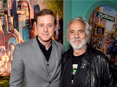 Actors Alan Tudyk (L) and Tommy Chong attend the Los Angeles premiere of Walt Disney Animation Studios' "Zootopia" on February 17, 2016 in Hollywood, California.