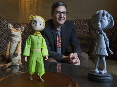 Mark Osborne, director of the new animated feature "The Little Prince," in Montreal, Quebec, February 10, 2016 with some of the characters from the movie, including the Fox, the Little Prince and the Little Girl.