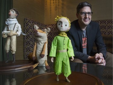 Mark Osborne, director of the new animated feature "The Little Prince," in Montreal, Quebec, February 10, 2016 with some of the characters from the movei, including the Aviator, the Fox, the Little Prince and the Little Girl.