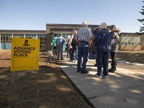 People act in line to votes at the advance poll at Ecole Henry Kelsey School in Saskatoon,Tuesday,March 29,2016.