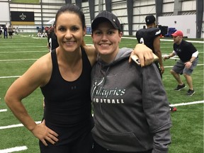 Phelycia Black (right) with Jennifer Welter, the first female NFL coach. Black is attending the Women's World Football Games at the New Orleans Saints training facility.