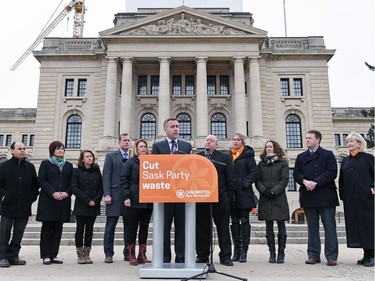 NDP Leader Cam Broten, surrounded by Regina NDP candidates, makes a campaign announcement in front of the Saskatchewan Legislative building in Regina, March 8, 2016.