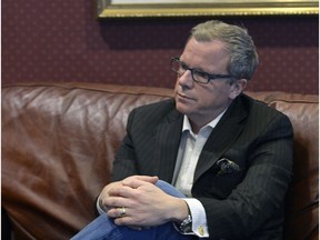 Premier Brad Wall watches the unveiling of the federal budget on March 22, 2016