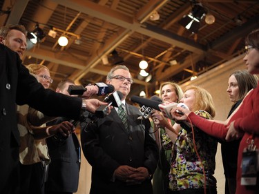 Saskatchewan Premier Brad Wall speaks with reporters following a leaders' debate with NDP leader Cam Broten at the CBC Saskatchewan building in Regina, March 23, 2016.