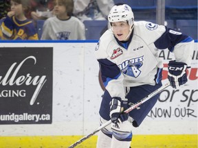 SASKATOON, SASK--JANUARY 01 2016-Saskatoon Blades forward Cameron Hebig moves the puck against the Prince Albert Raiders in third period WHL action on Friday, January 1st, 2016. The Blades defeat the Raiders 6-1. (Liam Richards/Saskatoon StarPhoenix)