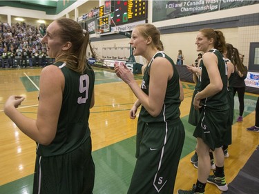 The University of Saskatchewan Huskies women's basketball team cheer as they defeat the University of Regina Cougars in the Canada West final in CIS action on Saturday, March 12th, 2016.