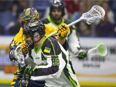 Saskatchewan Rush forward Zack Greer moves the ball against the Georgia Swarm in NLL Lacrosse action on Saturday, March 12th, 2016.