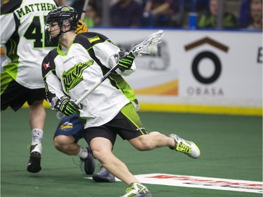 Saskatchewan Rush forward Riley Loewent moves the ball against the Georgia Swarm in NLL Lacrosse action on Saturday, March 12th, 2016.