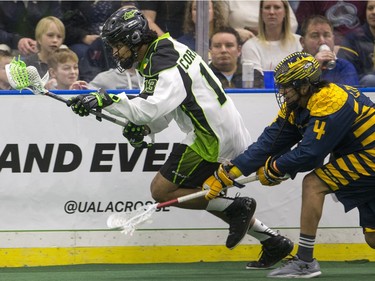 Saskatchewan Rush defence Jeff Cornwall moves the ball against the Georgia Swarm in NLL Lacrosse action on Saturday, March 12th, 2016.