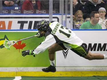 Saskatchewan Rush defence Jeff Cornwall moves the ball against the Georgia Swarm in NLL Lacrosse action on Saturday, March 12th, 2016.