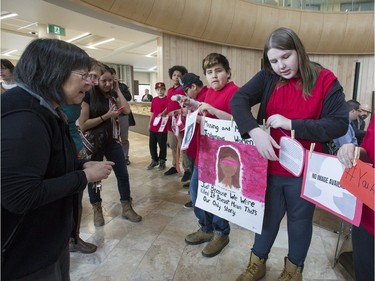 A group of Grades Seven and Eight students from St. Mary's Wellness and Eduction Centre spent their noon-hour performing a flash mob at the Gordon Oaks Red Bear Students Centre at the U of S to raise awareness for missing and murdered Aboriginal Women in Canada, March 21, 2016.