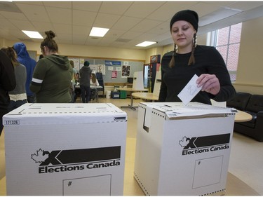 Teacher Lori Flath explained the voting process for Nutana High School students who then cast their ballots during voting day for high school students across the province with the upcoming provincial election, March 23, 2016.