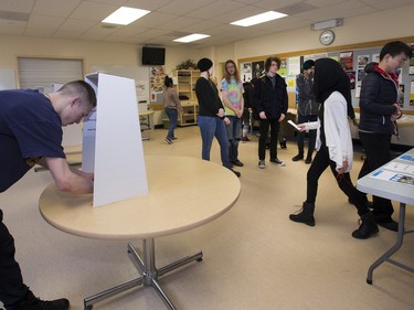 Teacher Lori Flath explained the voting process for Nutana High School students who then cast their ballots during voting day for high school students across the province with the upcoming provincial election, March 23, 2016.
