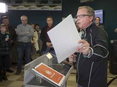 Saskatchewan Party leader Brad Wall speaks to media and supporters at the campaign office of Ken Cheveldayoff in Saskatoon, March 26, 2016.