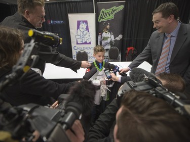 Nine-year-old Cohyn Wells speaks to media following his signing of a one-day with the Saskatchewan Rush, March 26, 2016. Wells is the Saskatchewan representative for the Children's Miracle Network's Champion Program.