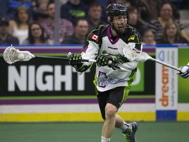 Saskatchewan Rush defence Ryan Dilks takes a shot against the Toronto Rock in NLL action, March 26, 2016.